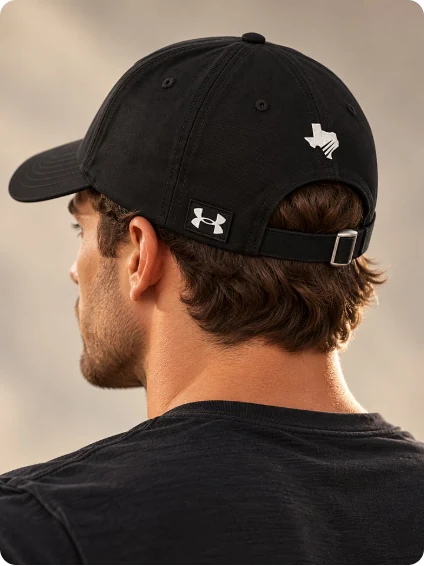Premium Under Armour® black hat with green/white logo